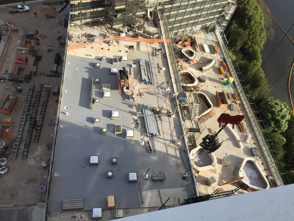 High-rise rooftop waterproofing in progress, Discovery Point Stages 8-10
